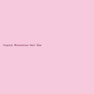 Sparkling pink crystal rhinestone hair bow attached to a soft alligator clip, isolated on a white background.